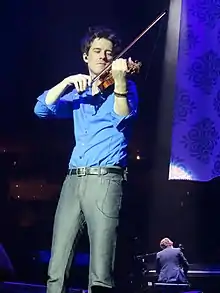 Christian Hebel performing live with Josh Groban, November 2013