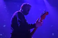 Savill performing with Slowdive, 2017