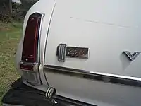 V8 badge as fitted to VC Valiant V8 wagon tailgates