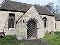 Church Porch with lattice gate, intended mainly to prevent birds nesting in the porch. St Guthlac, Little Ponton (England)