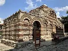 Apse view of a richly decorated yet partially preserved medieval Orthodox church