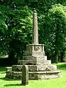 Stone churchyard cross in St Aldhelm's parish churchyard