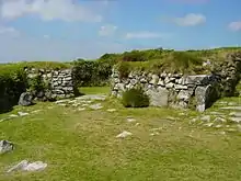 Fragmentary stone walls