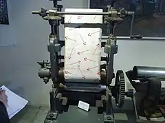 This machine prints the design onto the cloths.
