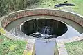 A circular overflow weir on the Droitwich canal