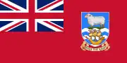 Red Ensign with Union Flag in the canton and the Falkland Islands coat of arms in the fly.