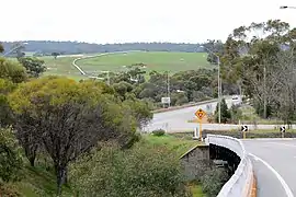 Photo of curved sloping bridge