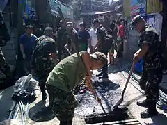 Army Reservists from the 201IB(RR) conduct Clean-up Drive (CMO) at Bgy Old Capitol Site, QC.