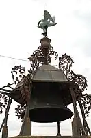 The bell of the Duke Jean and the bronze pelican on the north tower