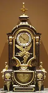 Clock, c. 1695, tortoise shell andbrass inlay, gilt bronze