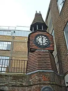 An Arts and Crafts clock tower.