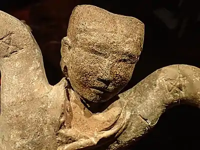 Closeup of earthenware dancer figurine from the Tomb of the King of Chu Tuolan Mountain Xuzhou Jiangsu Western han 2nd century BCE