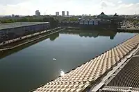 The lake with Surrey Quays Shopping Centre in the distance