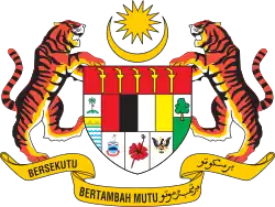 Shield showing the symbols of the Malaysian states with a star and crescent above and a motto below, supported by two tigers