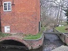Cogglesford Mill: a covered head race and the by-pass weir
