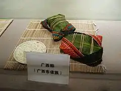 Fancy decorated zongzi in a museum display