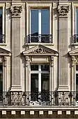 Colossal order of Composite pilasters. 1st and 2nd floors of a 19th-century building, 8 avenue de l'Opéra (Paris)