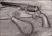 Colt 1851 Navy with powder flask