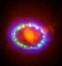 Composite of ALMA, Hubble and Chandra data, showing newly formed dust in the center of the remnant and the expanding shock wave.