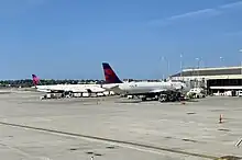 Delta Air Lines jets on the Concourse D ramp at Mitchell International Airport.