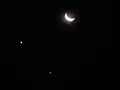 Conjunction of Venus (left) and Jupiter (bottom), with the nearby crescent Moon, seen from São Paulo, Brazil, on 1 December 2008
