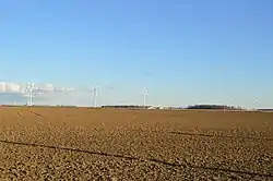 Fields and wind turbines in the township's far northeast
