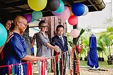 Guests cut the ribbon at the South Pacific WWII Museum in Luganville, Espiritu Santo, Vanuatu to open the SS President Coolidge Exhibition.