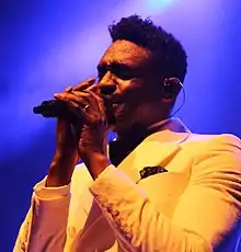 Corneille performing in 2019