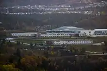 Corner Brook Regional High (upper white building).