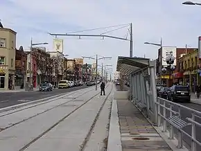 Looking east on St. Clair Avenue West in Corso Italia in 2009 with the nearly completed streetcar right-of-way in centre