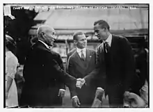 Jardien shaking hands with Japanese Prime Minister Ōkuma Shigenobu in 1915.