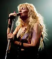Courtney Love singing onstage