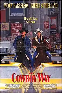 Two cowboys on horseback stuck in New York city traffic