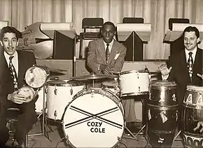 Musician Cozy Cole with two other musicians