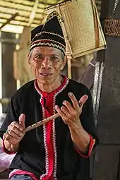 A Bidayuh man with a flute from Sarawak.