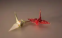 Cranes folded in origami paper