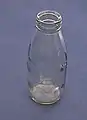 Reusable glass milk bottle