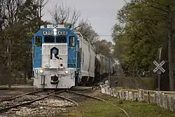 Picture of Chicago, Rock Island and Pacific Railroad's EMD GP38-2 diesel locomotive 4310 leading a train of storage cars through Tutwiler, Mississippi on the Mississippi Delta Railroad on 2021-03-31