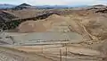 A new leaching pad being constructed where the ore will be leached in 100 feet layers, extracting the silver-gold-telluride from the mostly lamprophyre diatreme breccias.