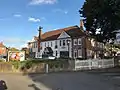 The Crooked Billet (Harvester) pub. The pub bears a plaque commemorating those who died when it was hit by a V2 rocket in 1944.