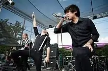 Crown the Empire performing in 2012.