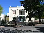 The facade of this late 19th-century building has notable Victorian and Georgian characteristics. The Crozier House earlier formed part of the old College Square of the Victoria College.