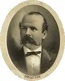 Drawn portrait of Cyrille Dion, a Caucasian, wearing an old-fashioned tuxedo and sporting a waxed handle-bar mustache.