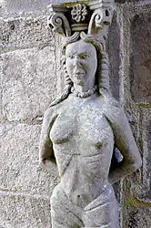 Just near the ossuary is this caryatid said to be based on a design by Sébastien Serlio.