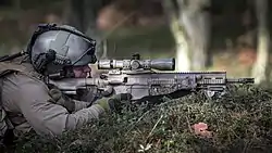 HK417 16″ 'Recce' paired with Schmidt & Bender 3–12×50 PM II used by a Netherlands Maritime Special Operations Forces (NLMARSOF) sniper.