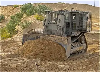 IDF Caterpillar D9 uses a standard blade or a special mine plow.