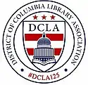 round sealwith the capitol building on it and a sort of shield and the logo DCLA125 along with the name of the association. Red, White and Blue.