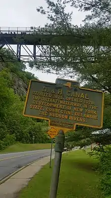 a picture of the marker, with the Rosendale Trestle in the background