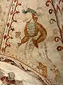 Envy Arch in the nave with a gothic fresco from 1511 of a man with a dog-head, which symbolizes envy (Dalbyneder Church [da], Denmark)