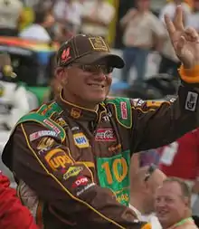 1999 NASCAR Winston Cup champion Dale Jarrett waves to the fans before the 2007 Sharpie 500